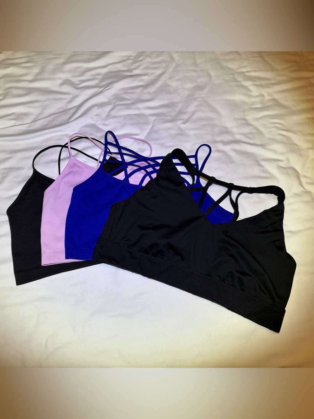 Like New Bundle of 4 Strappy Bralettes in Black, Royal Blue & Pink. Fits XL/XXL